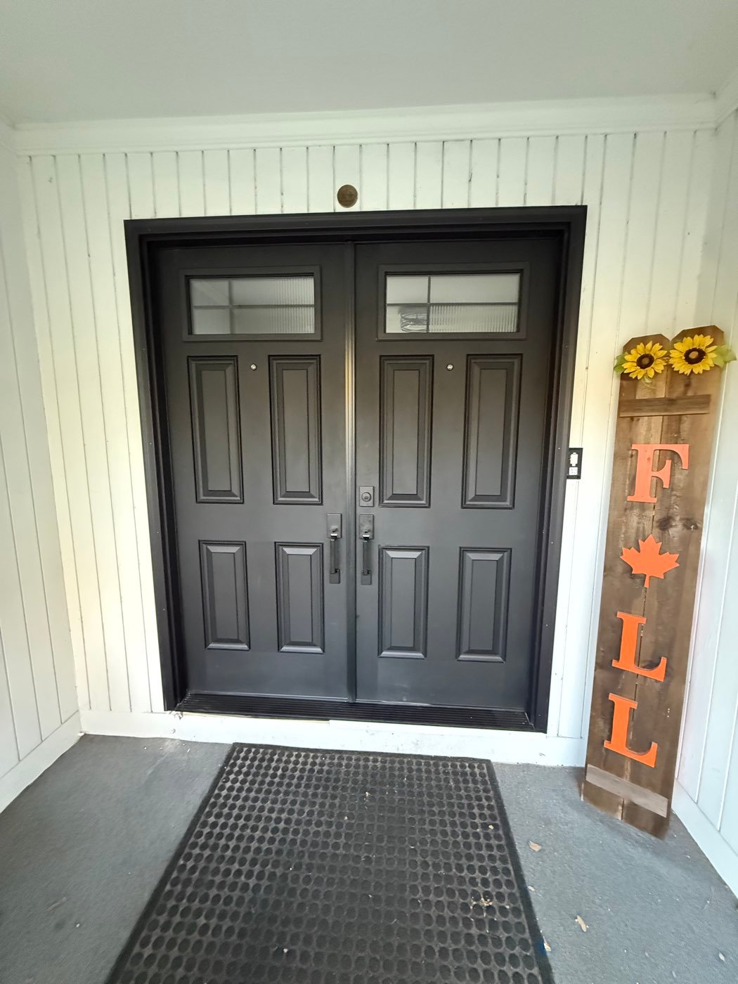 New dark gray double entry doors with glass panels installed by MBG Exteriors & More