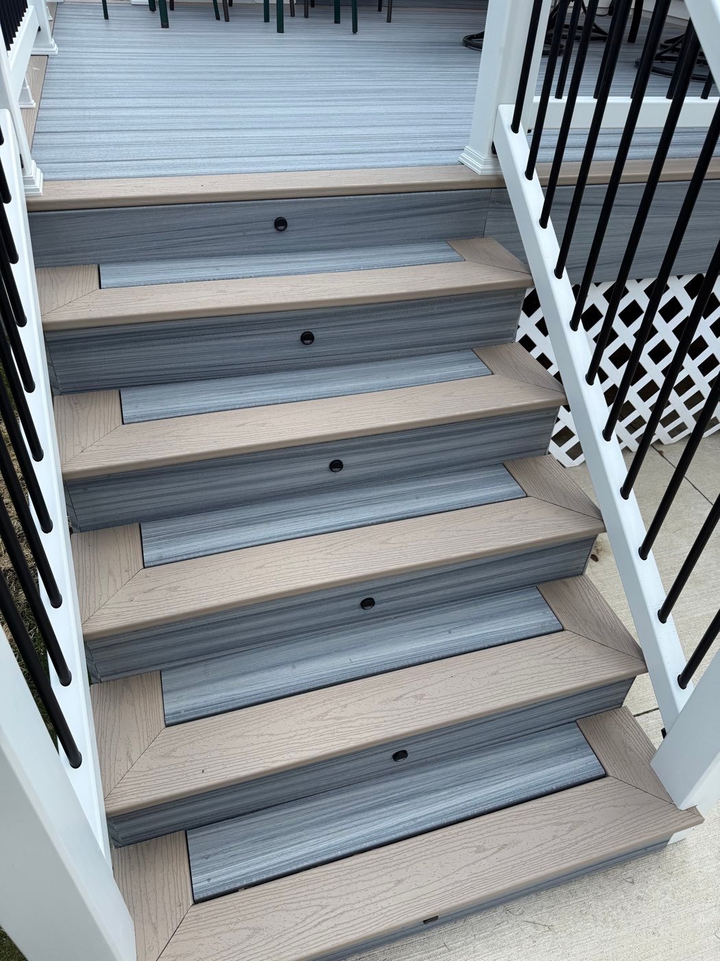Composite stairs with built-in riser lights