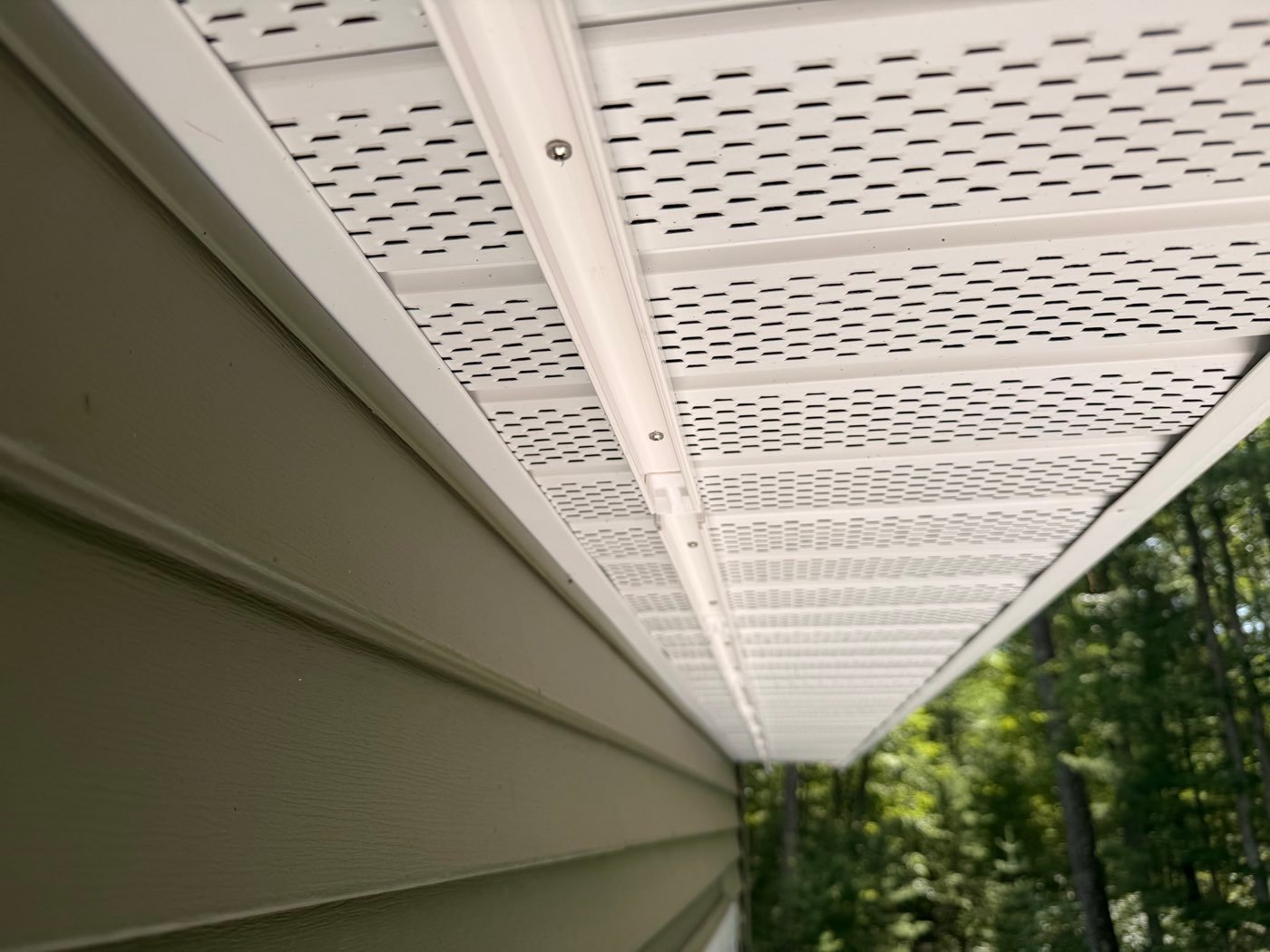 Close-up of the soffit lighting track during installation